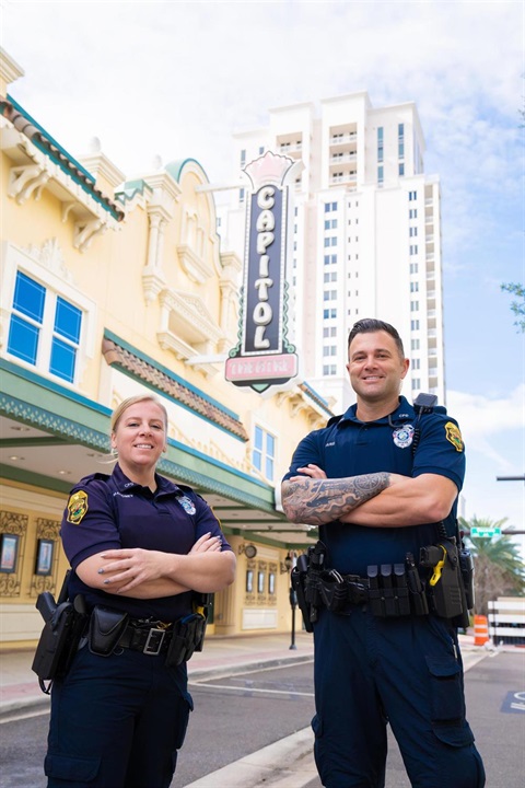 Officers in front of Capitol Theater