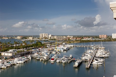 beach marina with boats and water