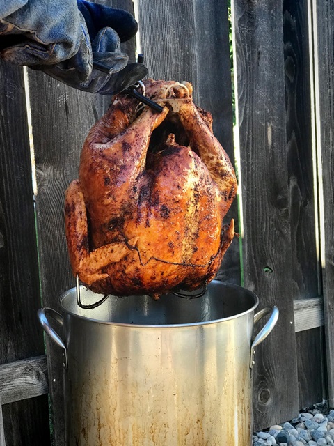 turkey in a fryer with grease