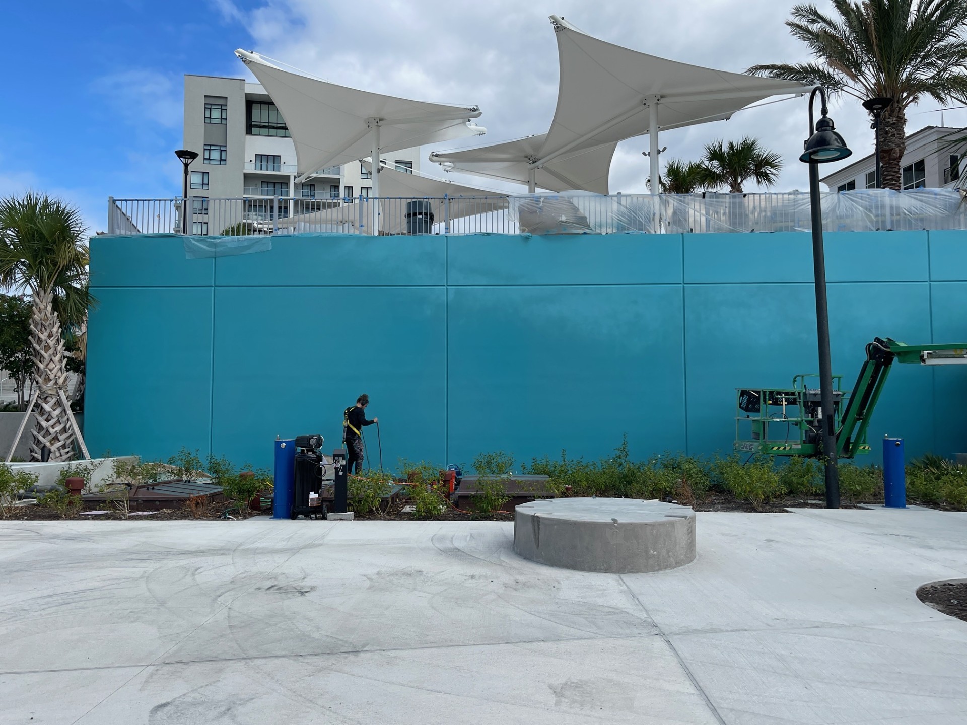 Image of blank mural wall before dolphins are added