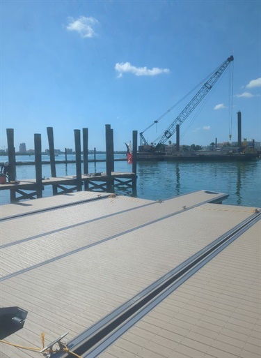 dock with panels overlooking water