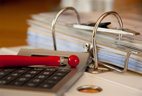 Image of calculator and papers