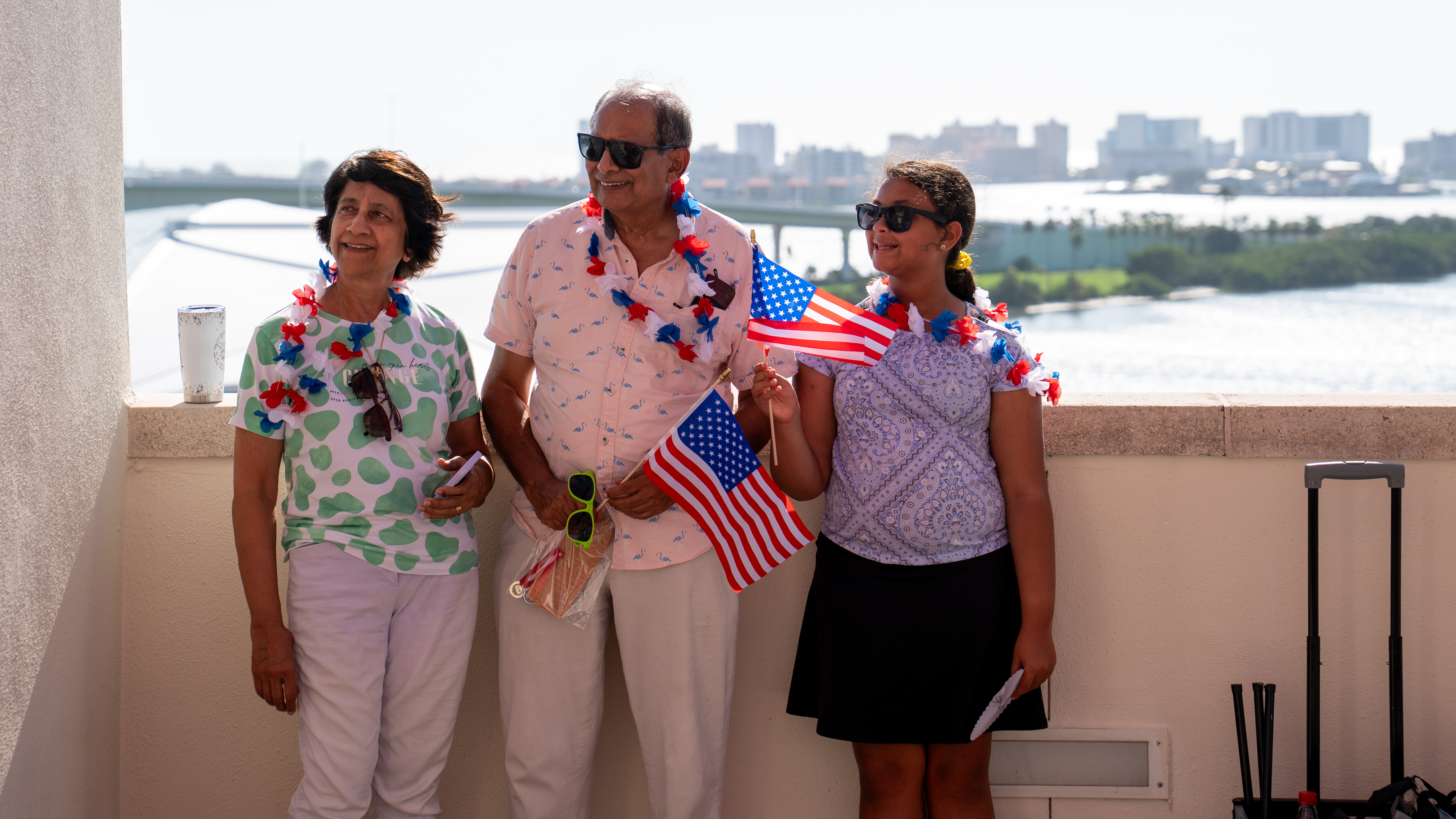 Family holding American flags