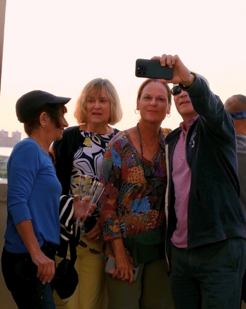 People Taking Photos with the Sunset