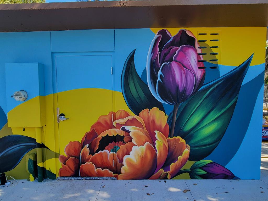 Outdoor wall mural of flowers.