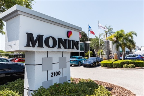 image of parking lot of large office building