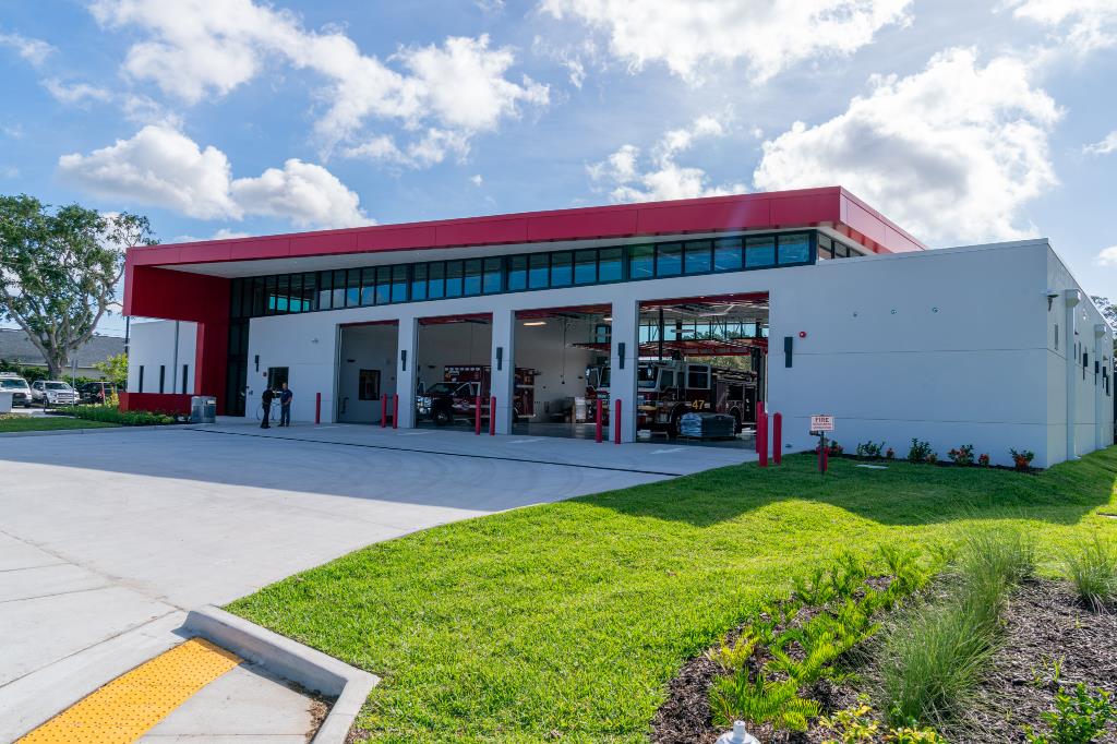 Street level view of fire station forty seven with all four doors open